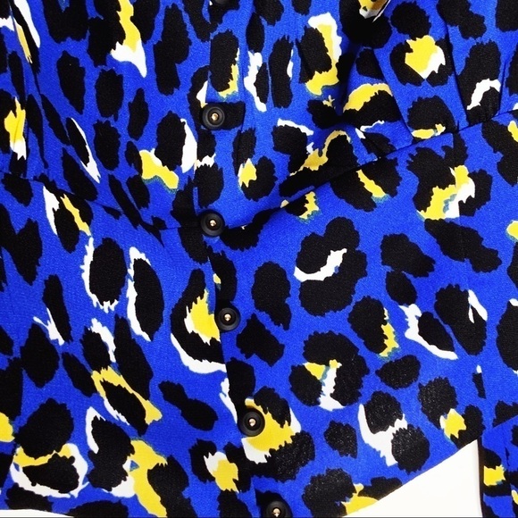 RAHI crop top. Blue with black and yellow print. - Picture 3 of 6